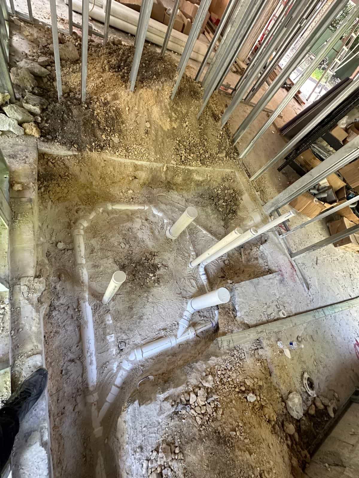 Before and after of a Underground pipe assemply by a plumber in Kendall